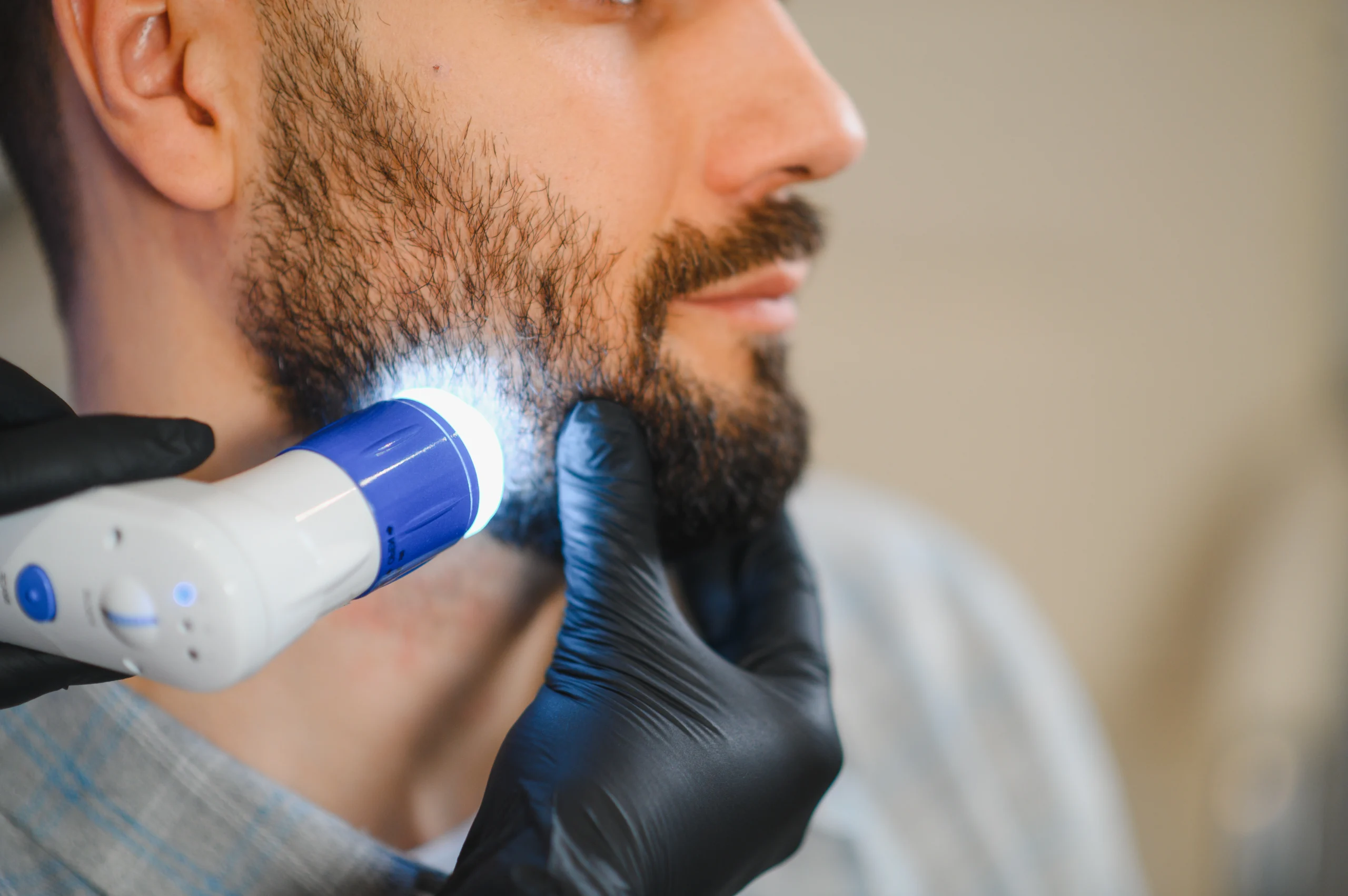 Close-up of a medical skin analysis device in use
