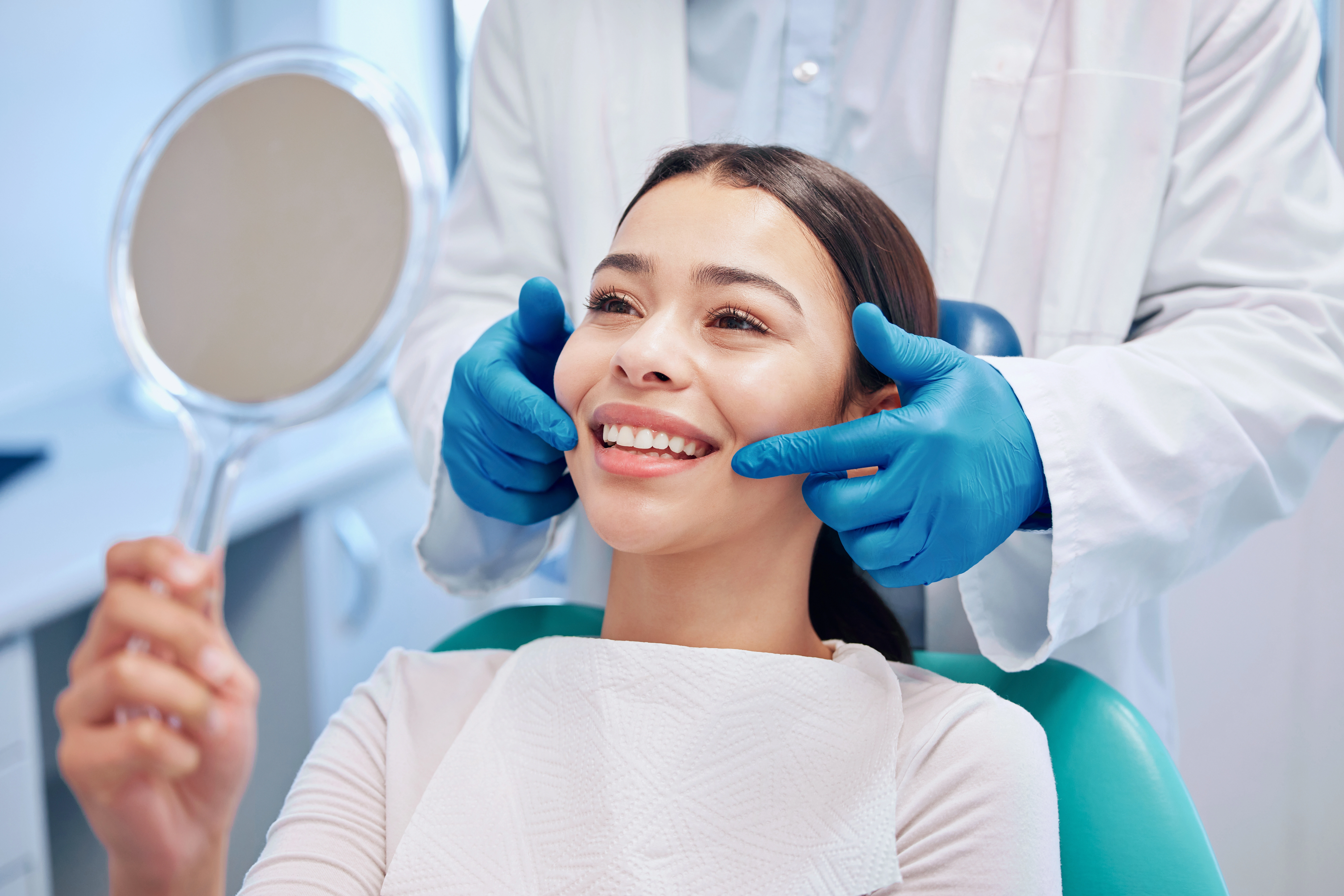 Young woman smiling during a dental checkup